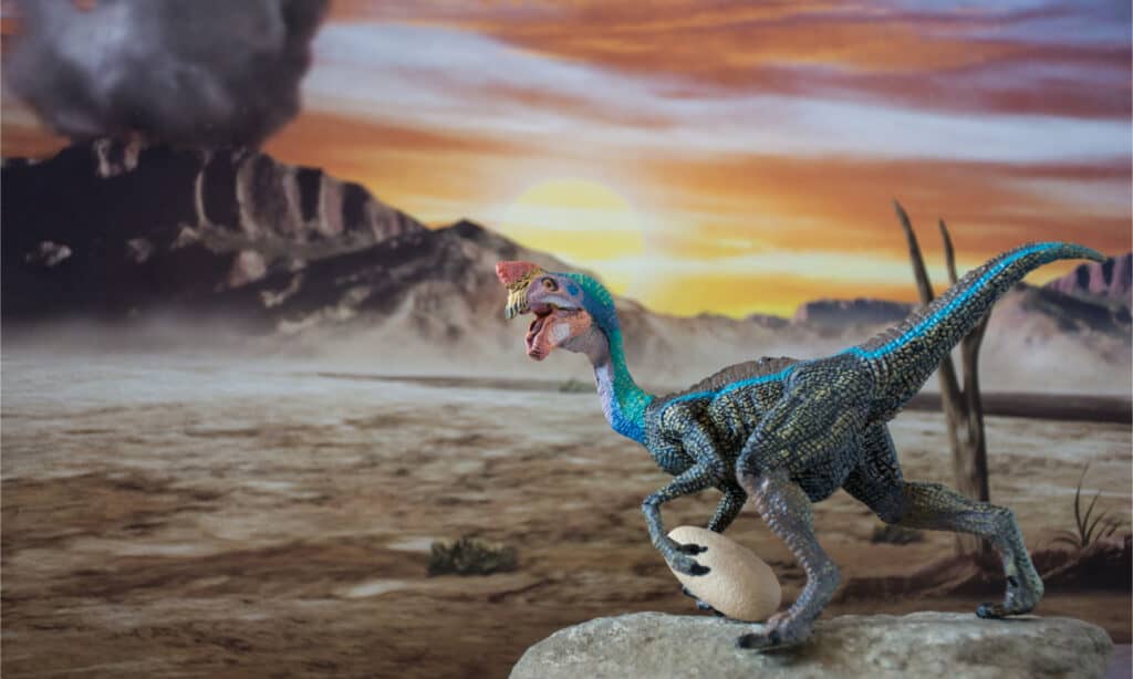 Oviraptor carrying an egg