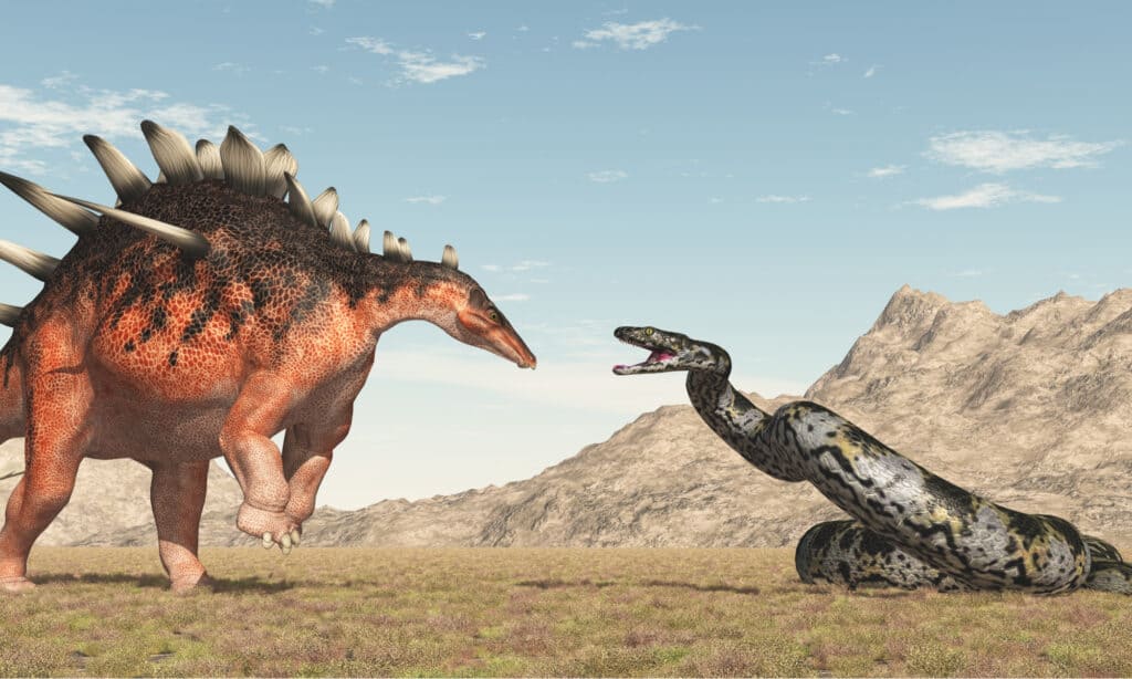 Titanoboa with dinosaur