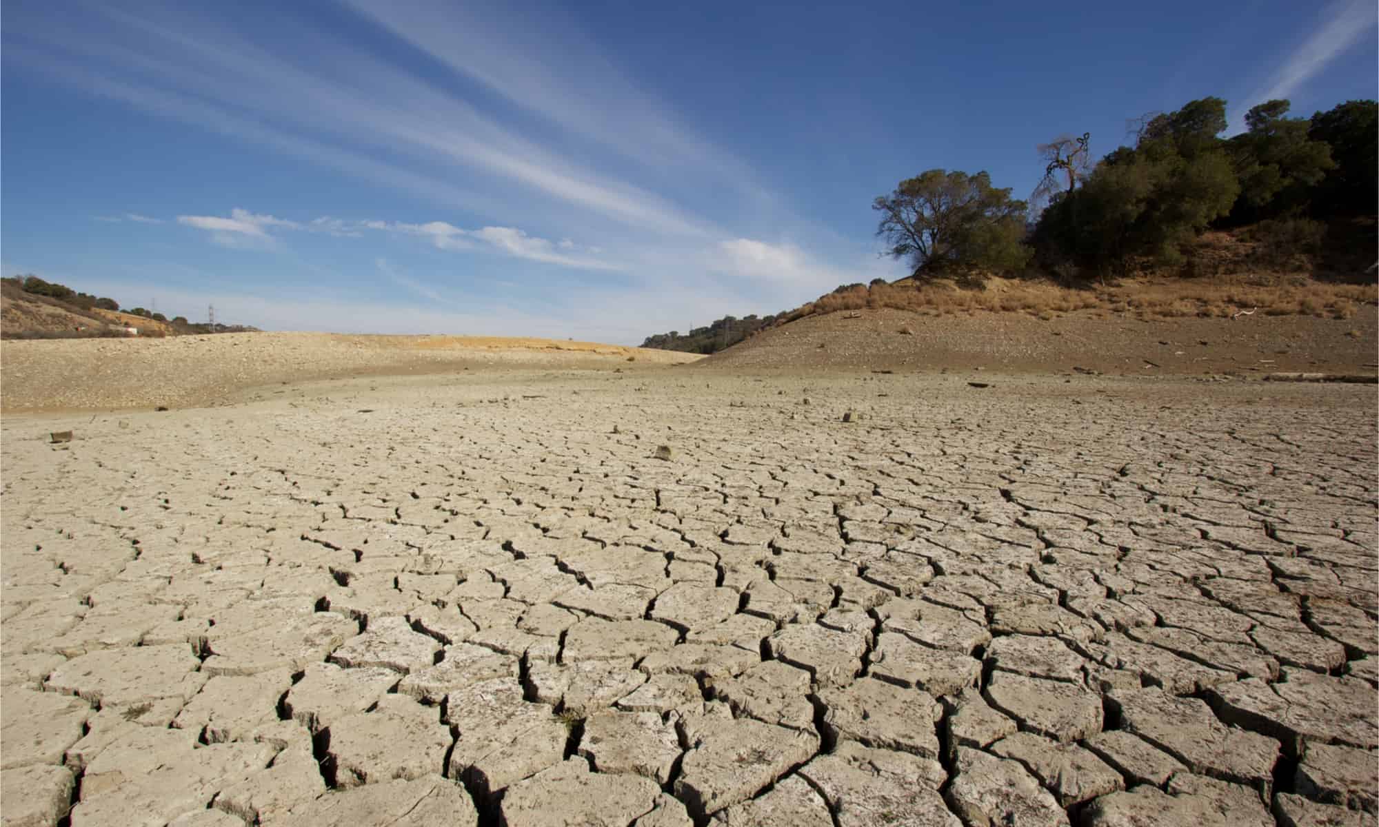 A dramatic south-looking view of Stevens Creek reservoir in California during a drought