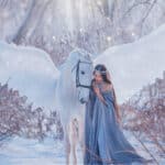 Fantasy beautiful woman goddess stroking mythical Pegasus, white magic wings. 