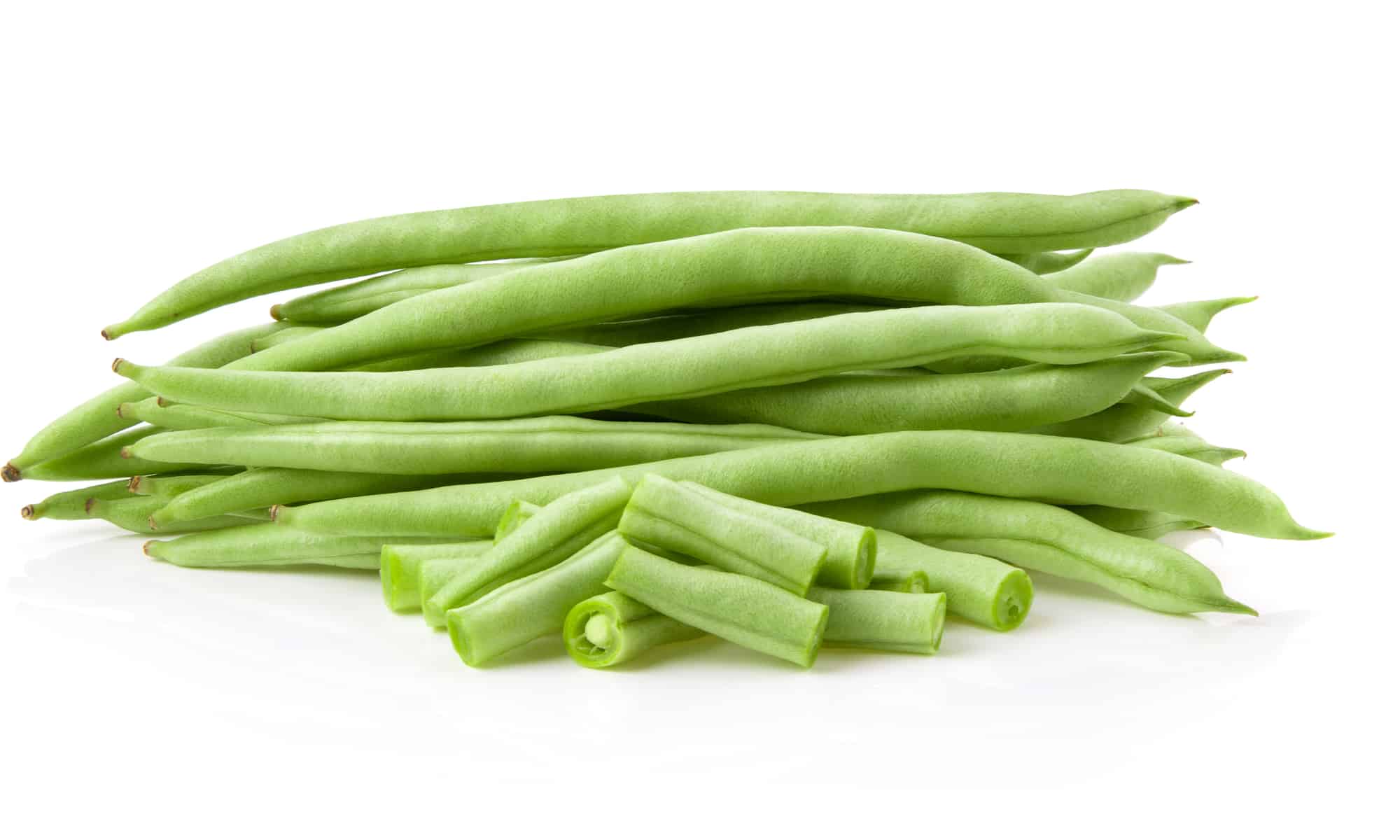 Raw green beans on white background