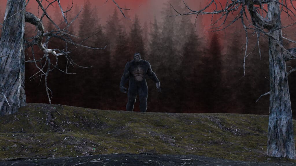Bigfoot standing at the crest of a hill