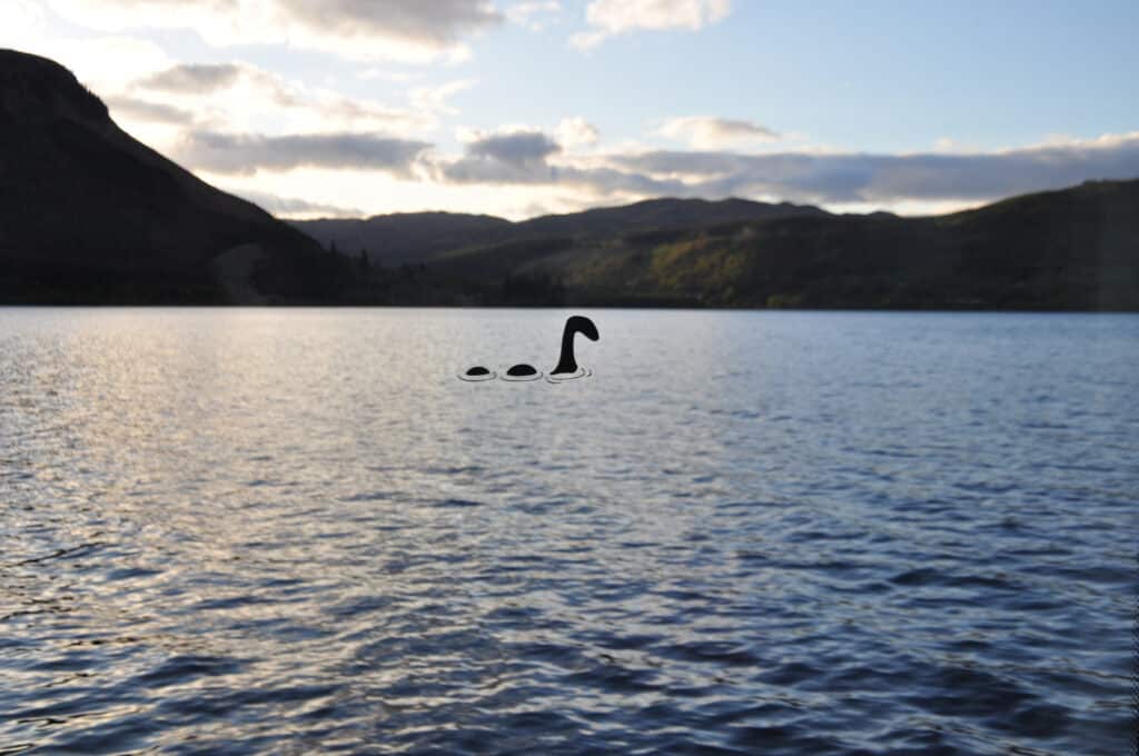 loch ness monster floating in a lake
