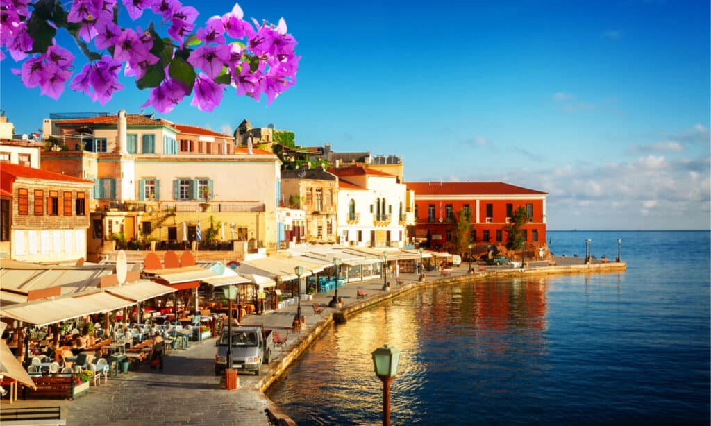 bay of Chania at sunny summer day, Crete Greece with flowers