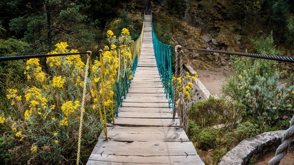 Old bridge leading to the summit of mount Ajusco