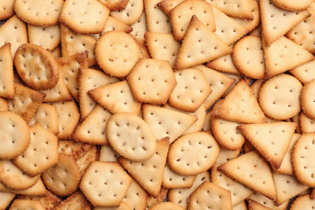 A variety of crackers displayed as a background