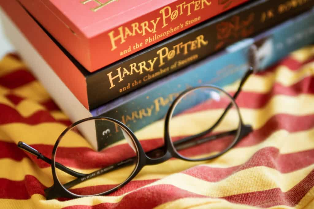 Harry Potter books with round shape eyeglasses.