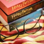 Harry Potter books with round shape eyeglasses.