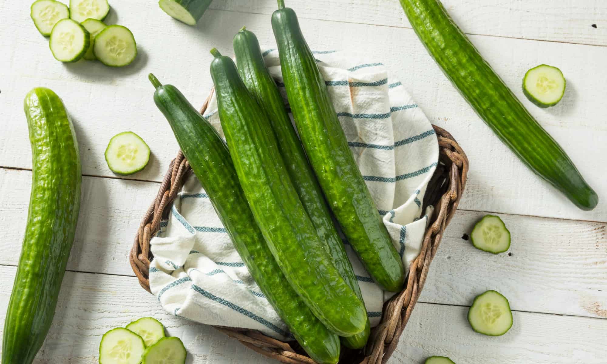 https://a-z-animals.com/media/2022/08/healthy-organic-green-english-cucumbers-picture-id941591668.jpg