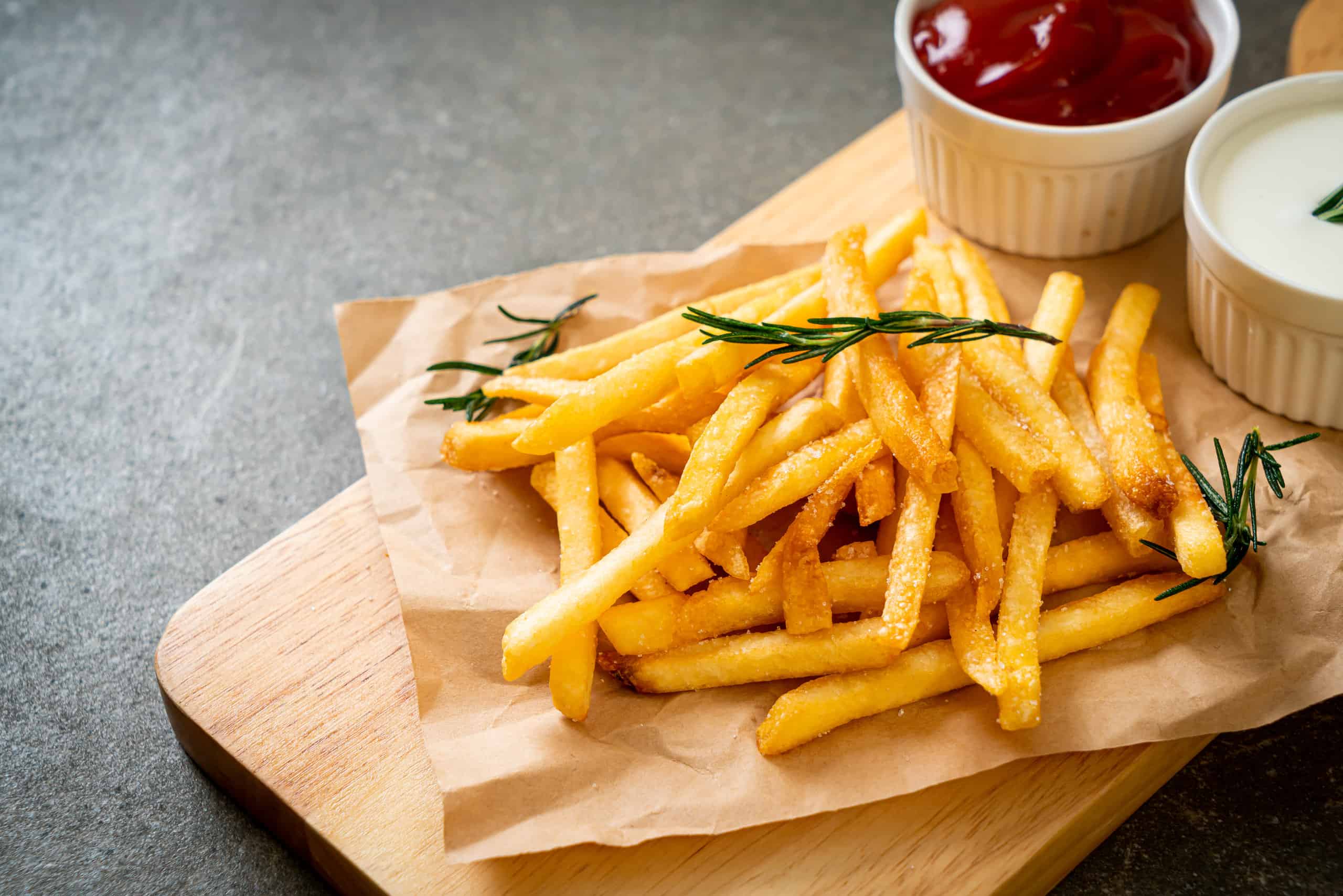 French fries with sour cream and ketchup