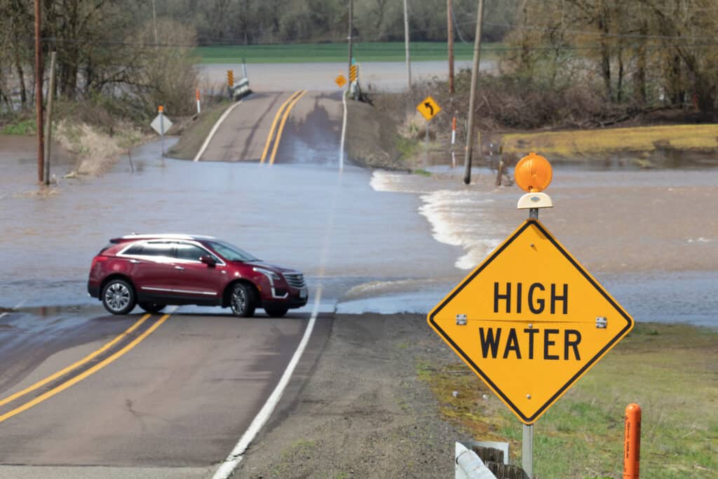 Flash flooding of a street in Shedd, Oregon