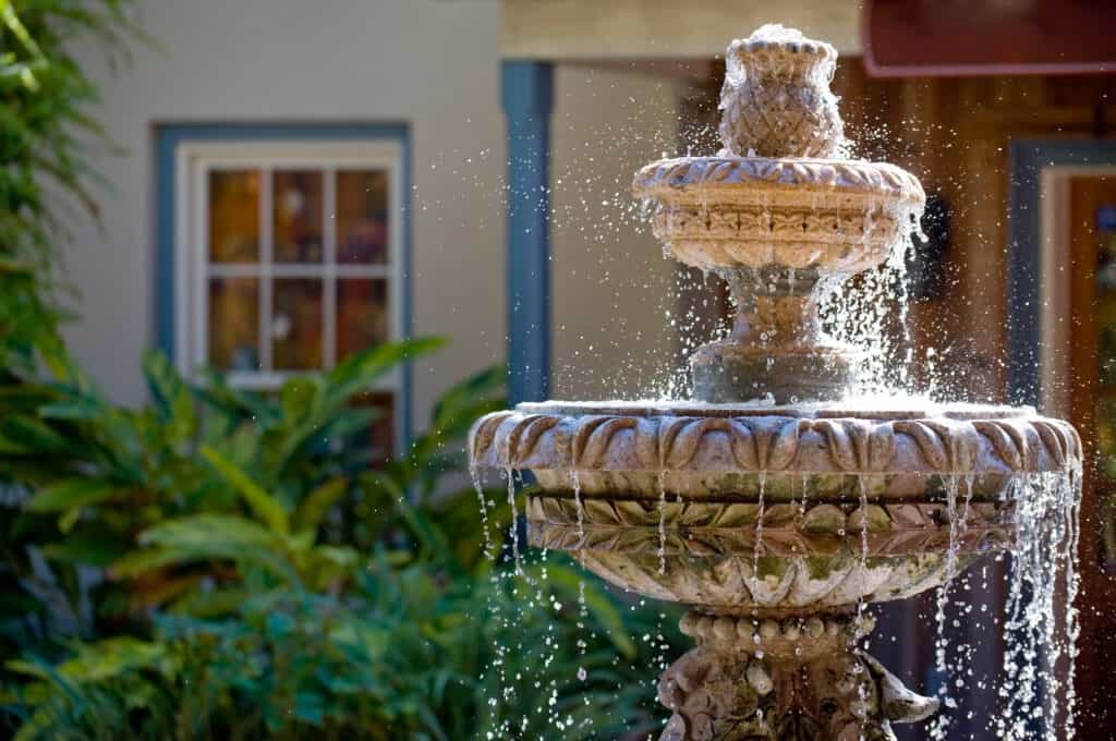 How Disney prevents mosquitoes: Two-tiered garden fountain flowing with water