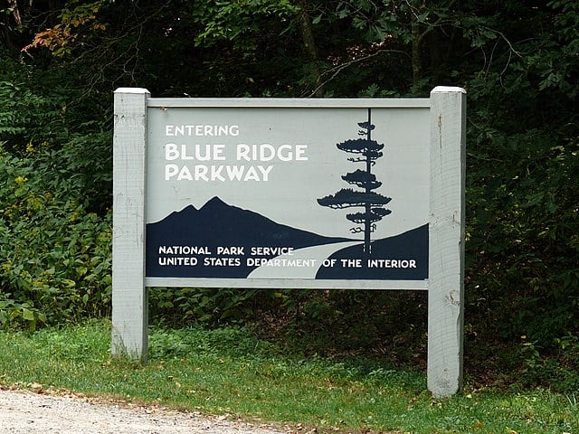 Blue Ridge Parkway sign located near the town of Cherokee and the Great Smoky Mountains National Park.