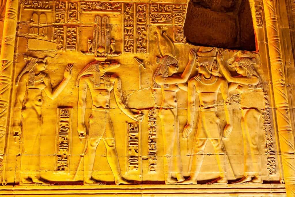 Relief and hieroglyphs at the wall of The Temple Of Sobek and Horus at Kom Ombo in the night, Aswan Governorate, Upper Egypt.