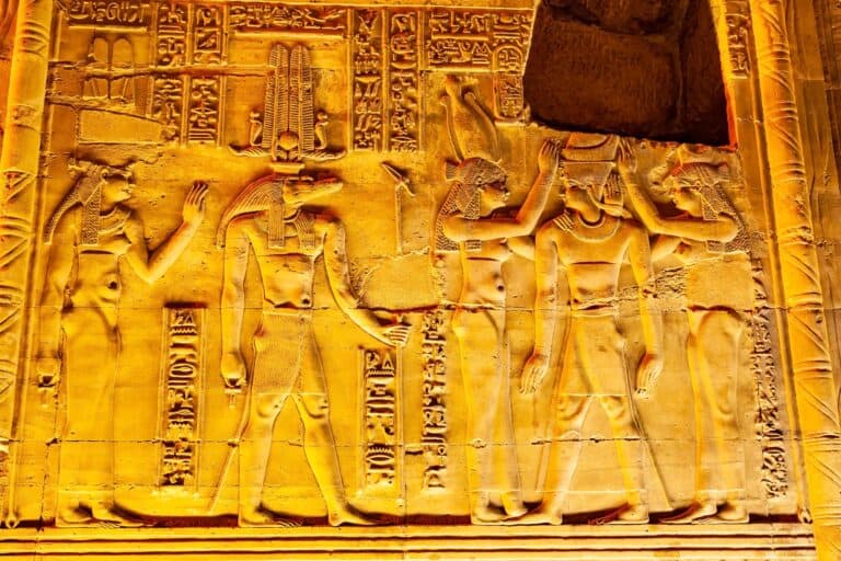Relief and hieroglyphs at the wall of The Temple Of Sobek and Horus at Kom Ombo in the night, Aswan Governorate, Upper Egypt.
