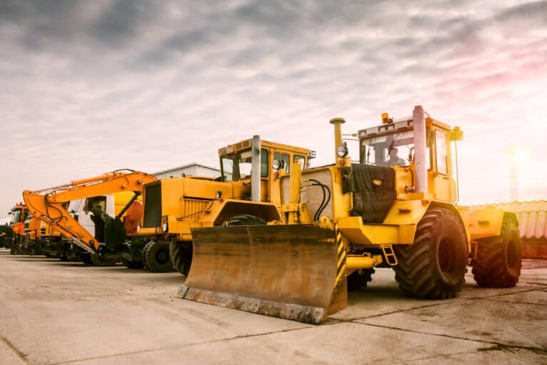 A line of construction vehicles