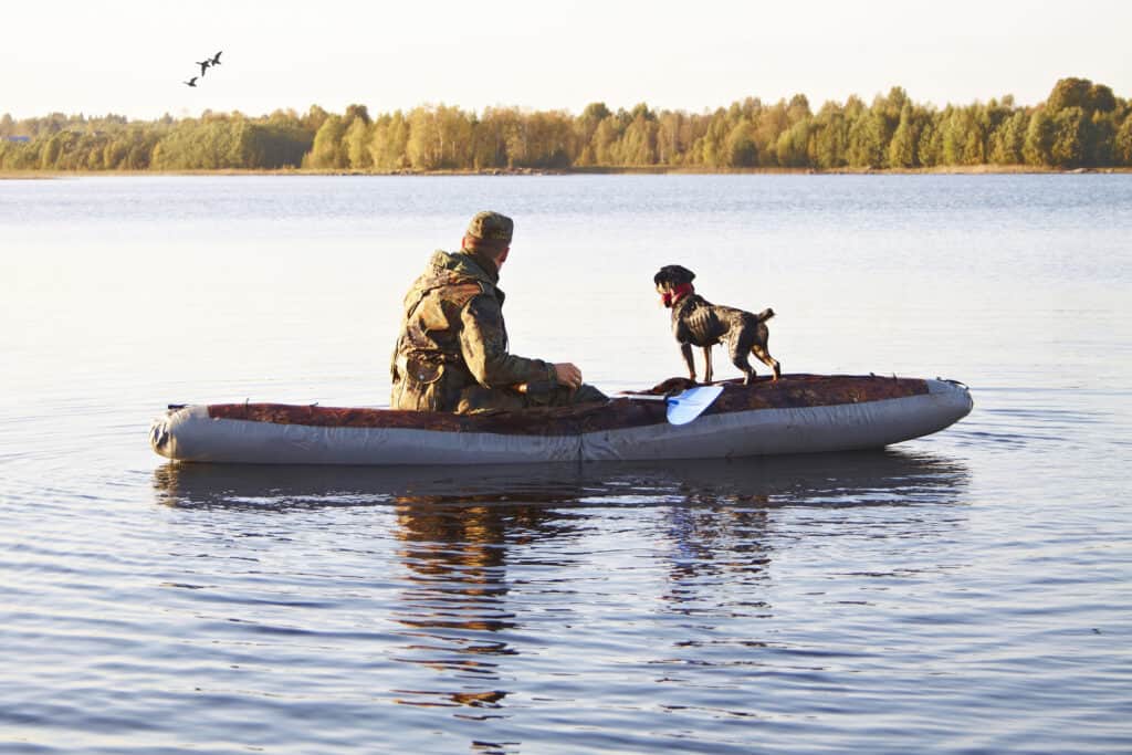 A hunter wearing a camouflage jacket.