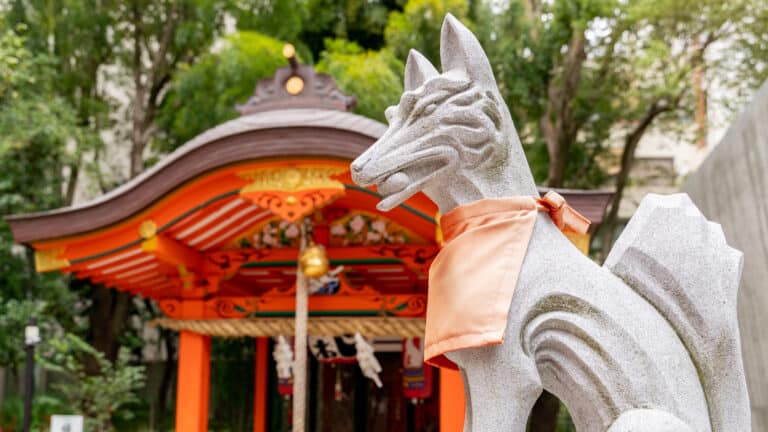 A statue of a Kitsune at Ikuta Shrine. Part of Japanese mythology and folklore.