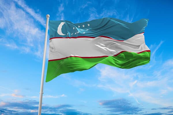 Flag of Uzbekistan waving in the wind.