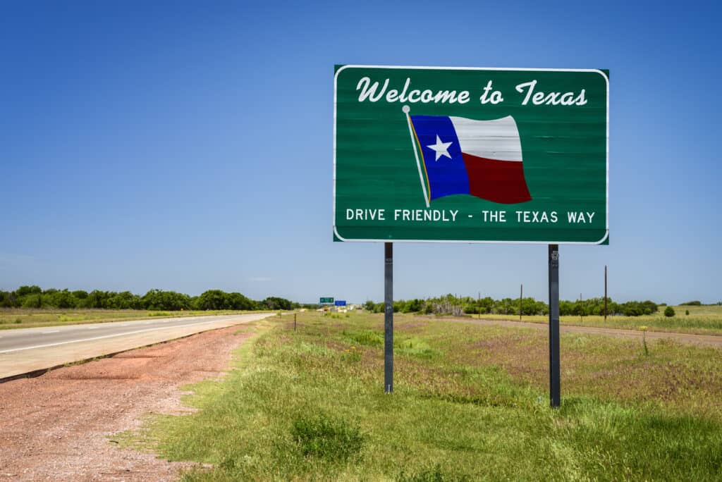Welcome to Texas sign on an open road