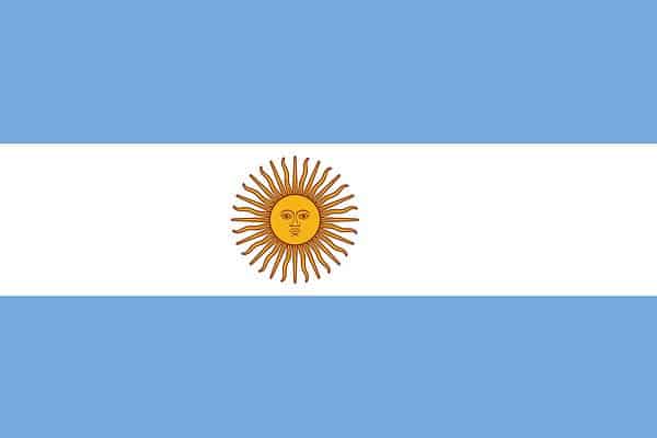 The flag of Argentina is composed of three equally wide horizontal bands colored light blue and white with the Sun of May in the center.