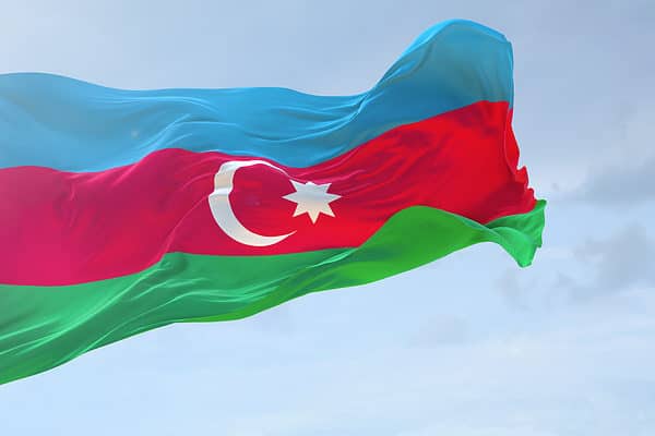 The flag of Azerbaijan waving in the wind.