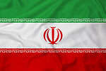 The flag of Iran is a tricolor with three evenly spaced bands of green, white, and red. In the center of the white band is the country's crest, which is red and stylized to look like a tulip.
