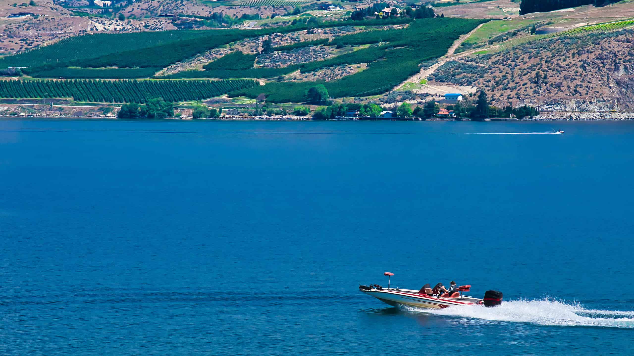 Speed boat cruising on Lake Chelan in Washington.