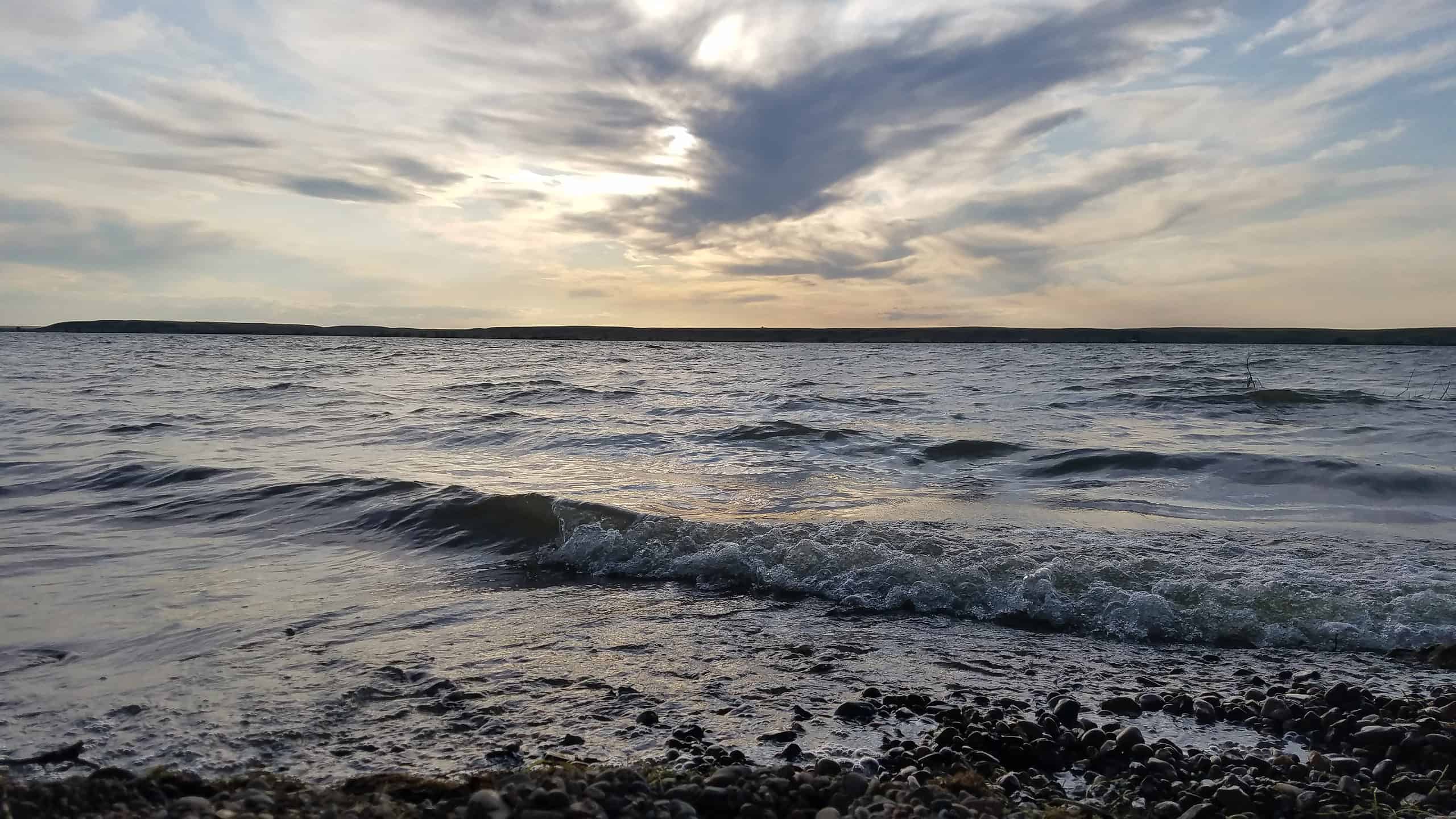waves hitting beach at swimming holes in North Dakota
