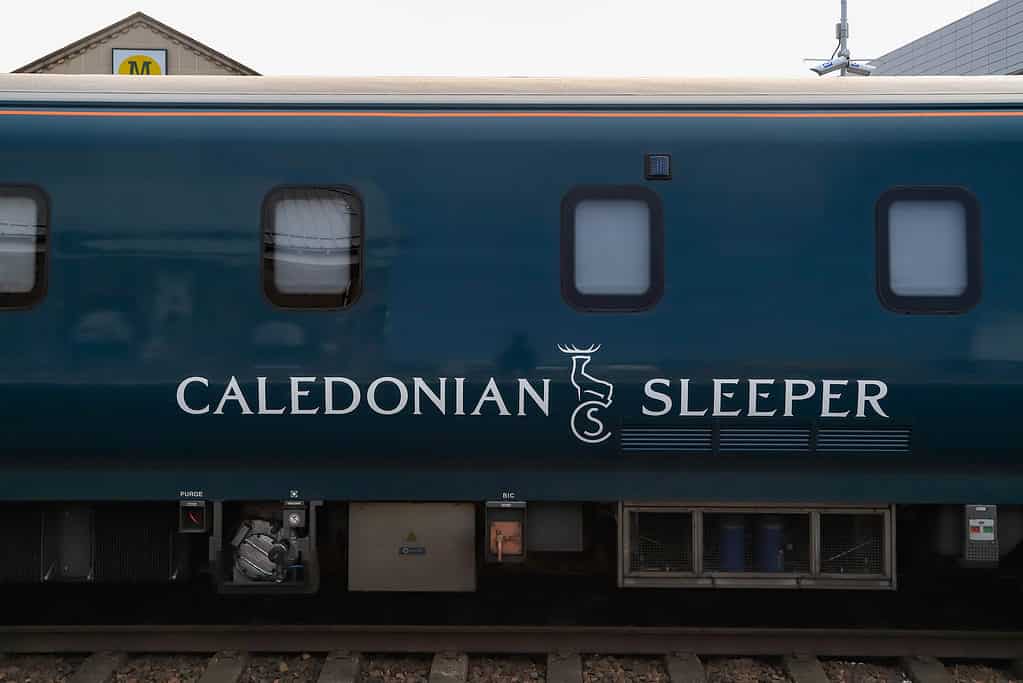 Closeup shot of blue Caledonian sleeper train