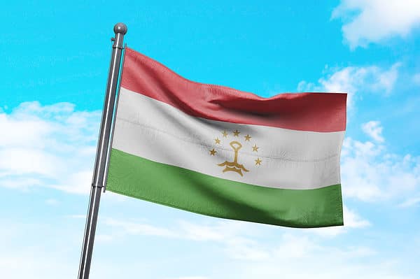The flag of Tajikistan features red, white, and green.