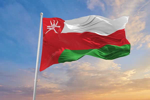 The flag of Oman is flown proudly.