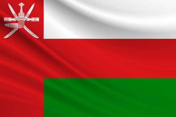 The flag of Oman is red, green, and white.