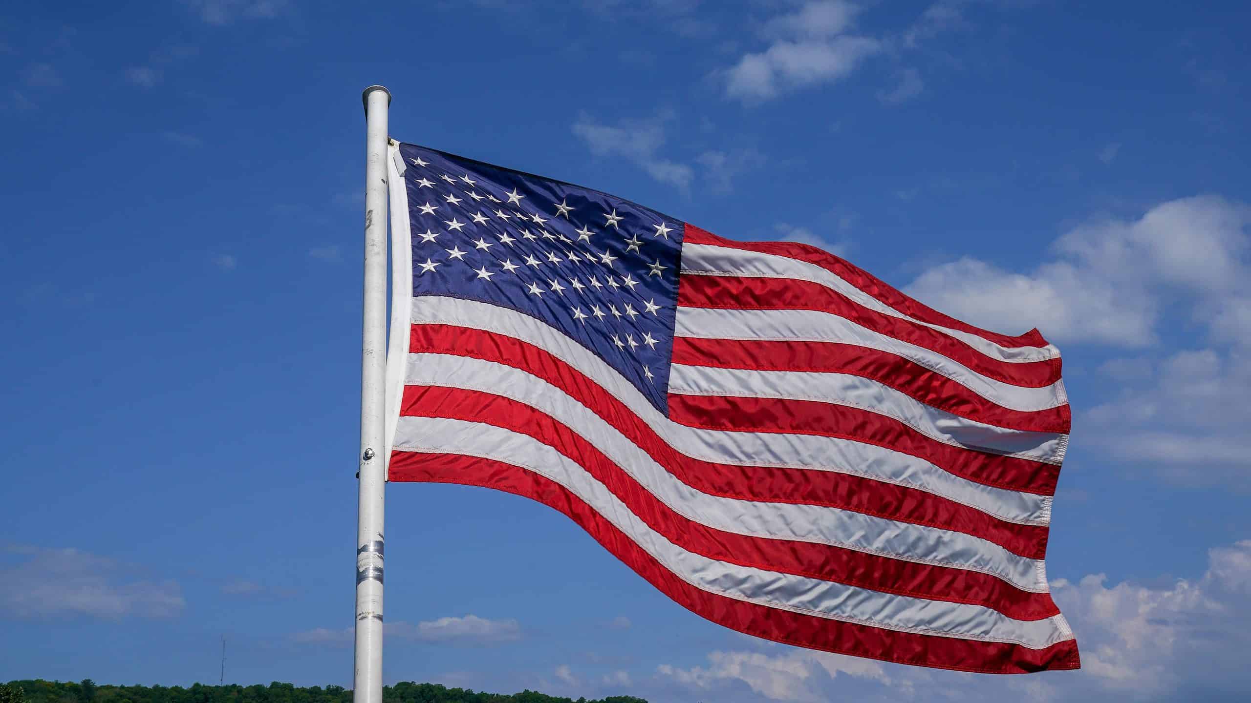 Flag of the United States of America (American flag) blowing in the wind