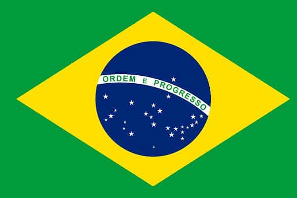 The flag of Brazil consists of a vivid green field which features a yellow diamond with a blue globe in it.