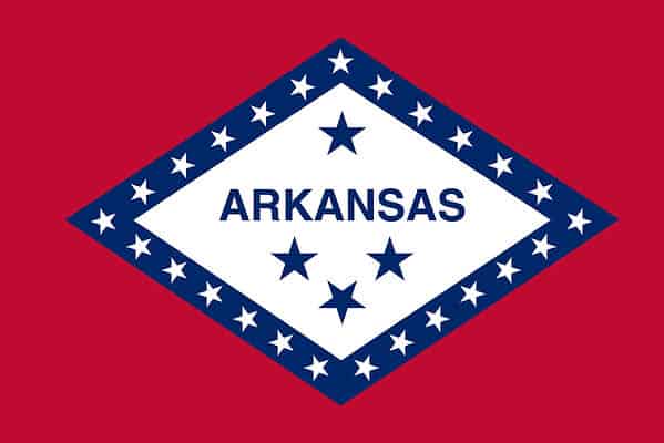 The flag of Arkansas consists of a red field charged with a large blue-bordered white lozenge with 29 five-pointed stars and 