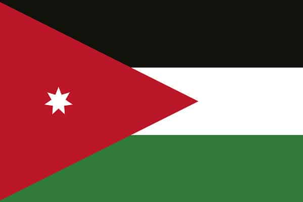 The flag of Jordan has a horizontal triband of green, white and black, with a red chevron at the hoist side and a white seven-pointed star at its center.