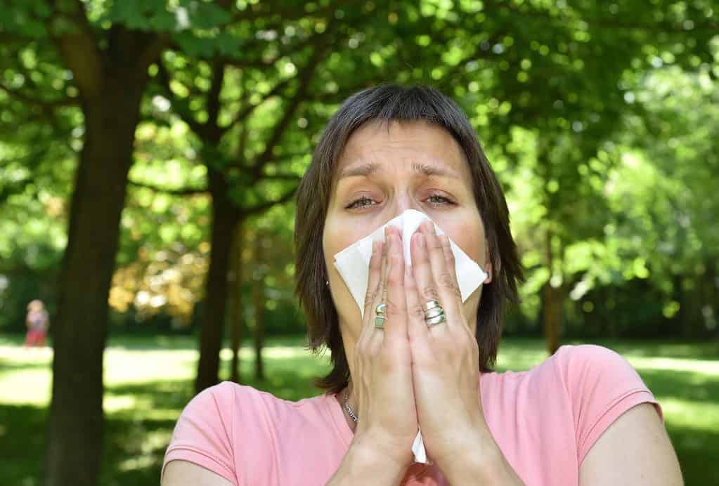 A woman with allergy symptoms