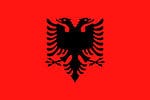 The flag of Albania is a red field with a black two-headed eagle in the center.