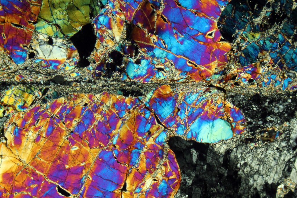 Mylonite up-close - shining, swirling, metallic, gem-colors