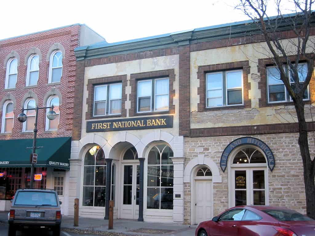 The First National Bank in w:Northfield, Minnesota robbed by the w:James-Younger Gang on September 7, 1876. This is now a museum, no longer an operating bank. This is located within the w:Scriver Block Building.
