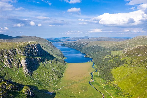 Aerial view of the Glenveagh National Park with castle Castle and Loch in the background - County Donegal, Ireland.