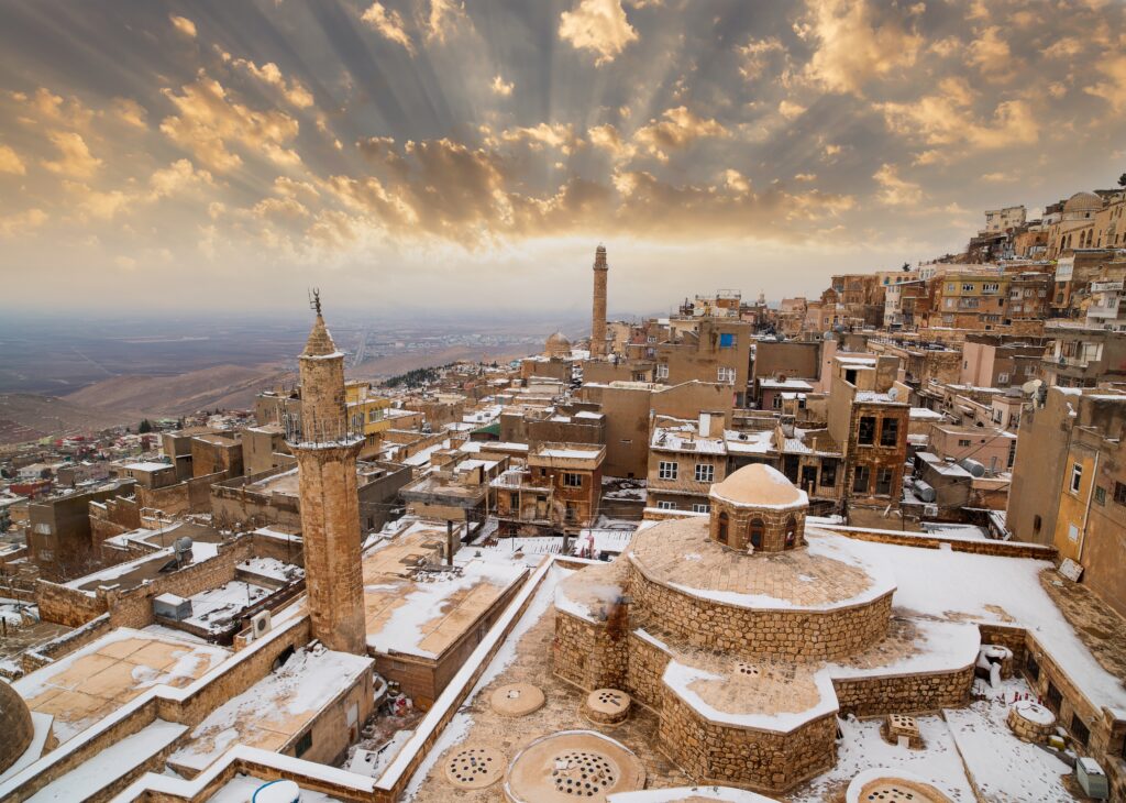 Sunset view of Old Mardin in winter time with its traditional stone houses.