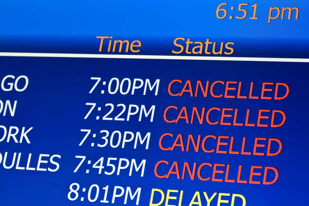 Board of canceled flights at an airport