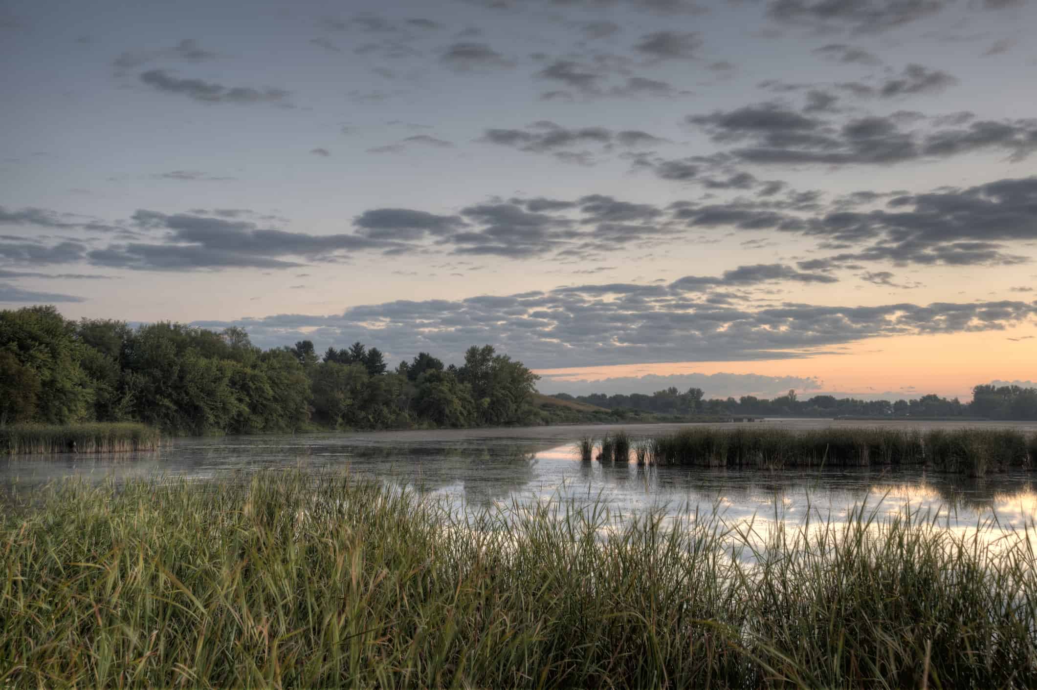 Calm and serene Okoboji Lake in Iowa, a great spot for fishing.