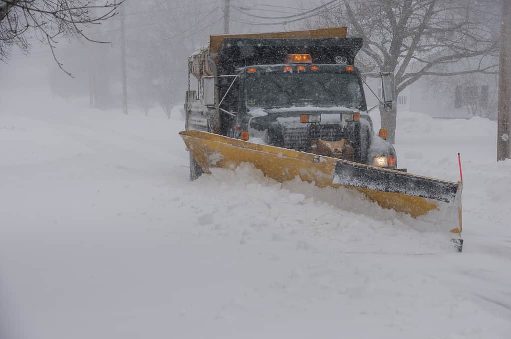 This snowplow is clearing the snow during a nor'easter in Massachusetts.