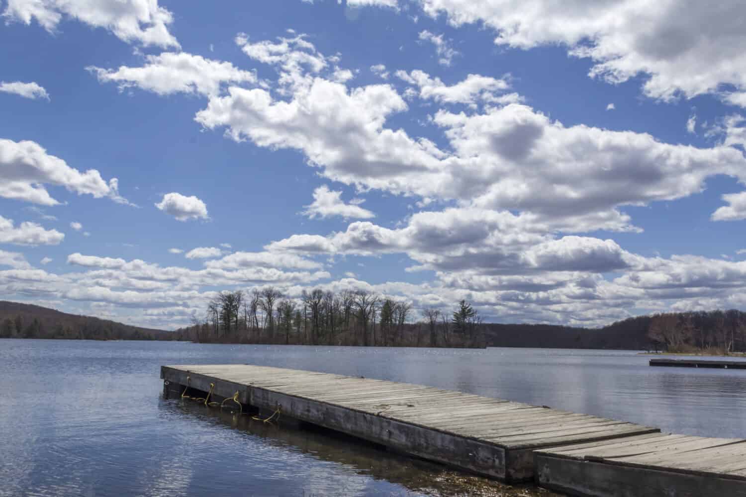 Dock stretches across Wawayanda Lake in early springtime