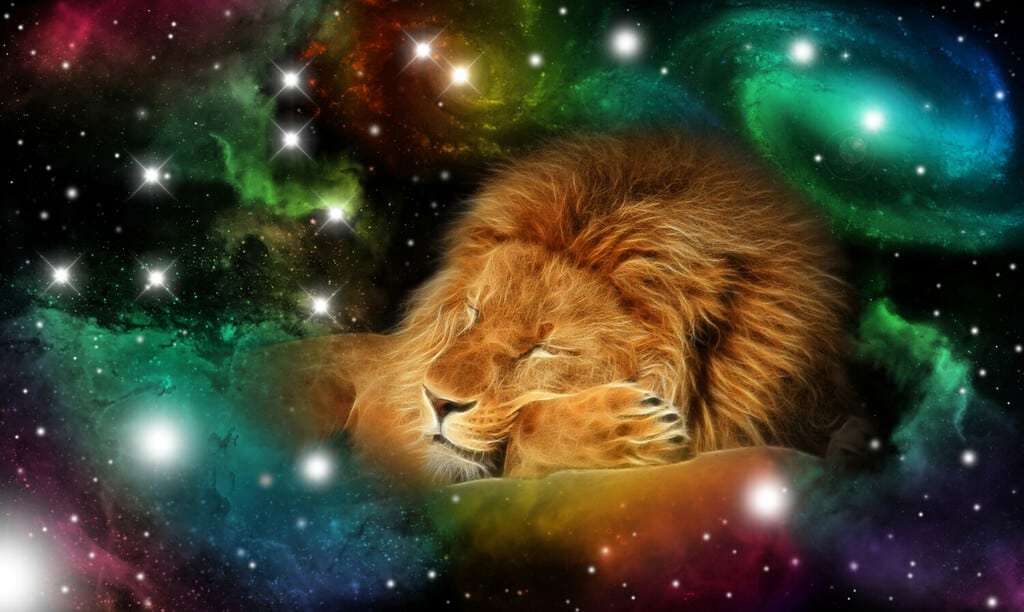 sign of the zodiac leo - portrait of a lion in a colorful universe with some galaxies and stars