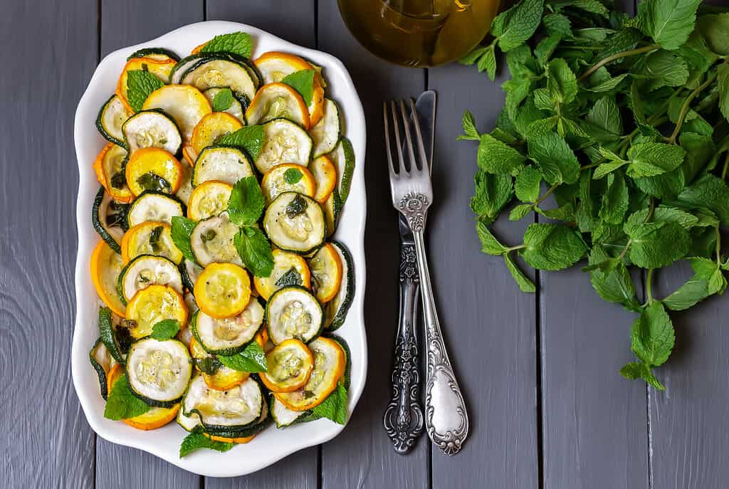 Zucchini alla Scapece. Zucchini and summer squash marinated in olive oil with garlic and mint. Italian cuisine.