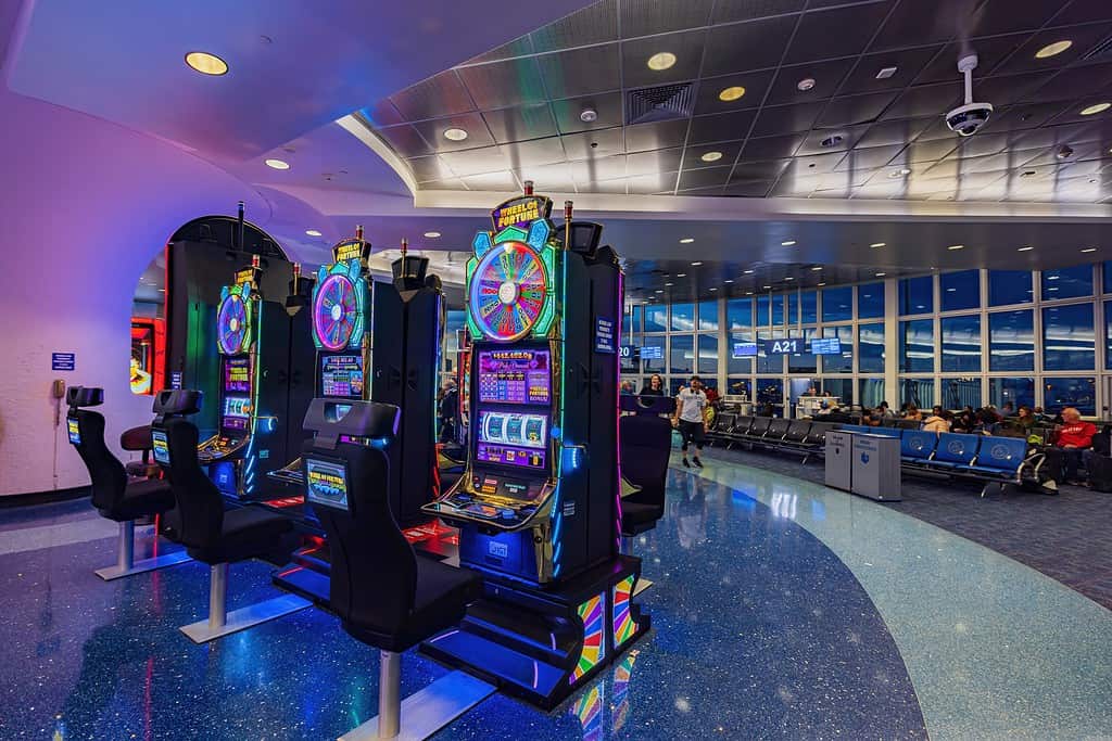  Interior view of the waiting room with slot machines in Harry Reid International Airport